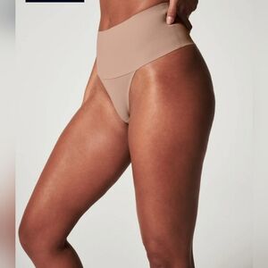 SPANXsmooth™ NWT  Undie-tectable®Thong - CAFE Au Lait Color - XL